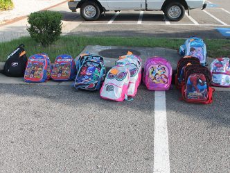 row of backpacks