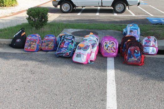 row of backpacks