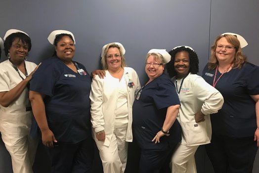 Six nurses pose for a photo