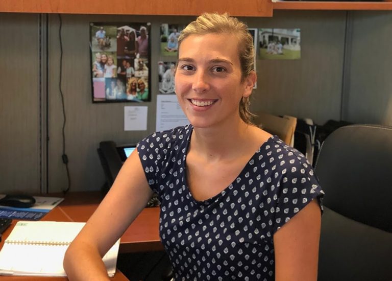 Woman seated at desk