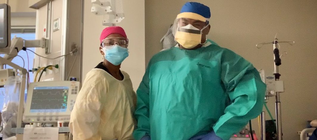 Two respiratory therapists in PPE