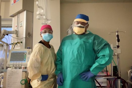 Two respiratory therapists in PPE