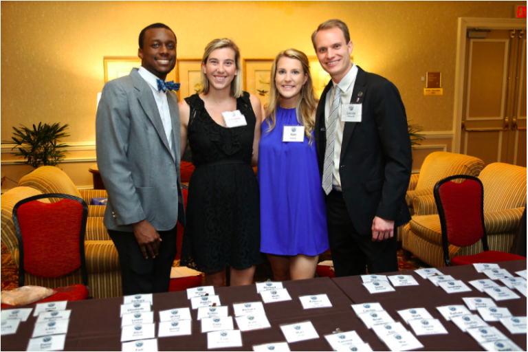 people standing for photo