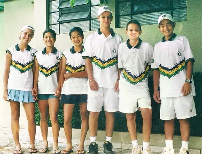 Teen tennis players in uniforms