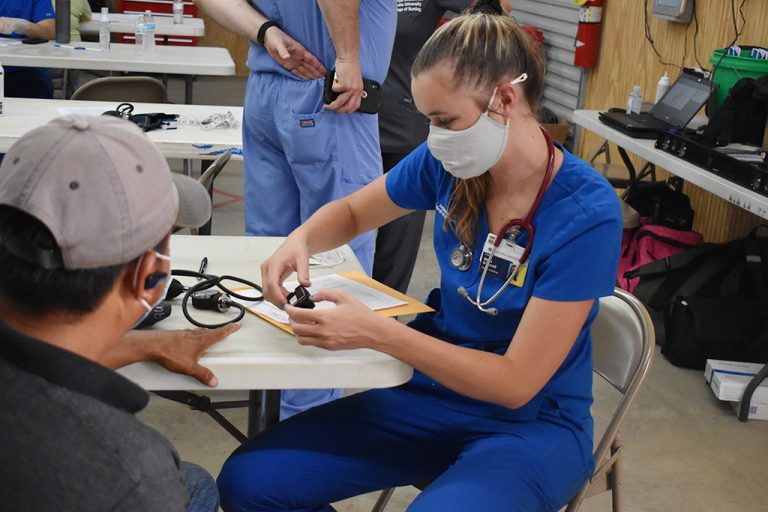 Woman helping patient