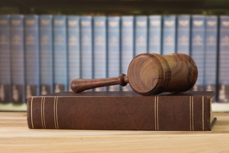 a gavel and a law book