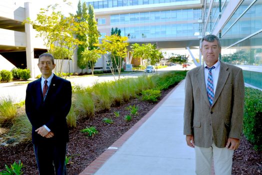 Two men standing outdoors