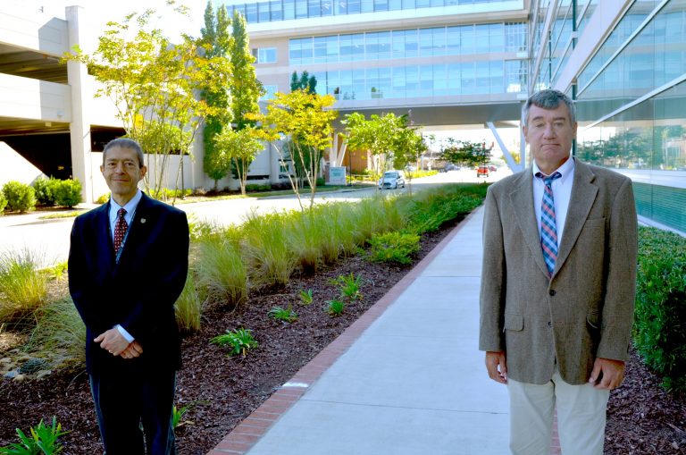 Two men standing outdoors
