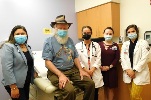 Group of doctors and patient