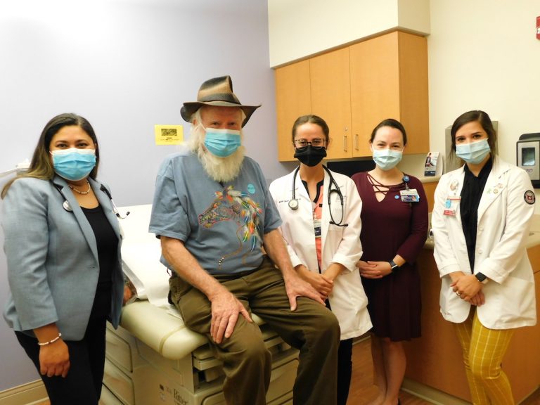 Group of doctors and patient