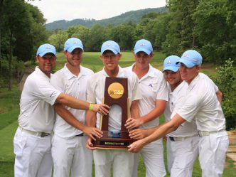Golfers with trophy