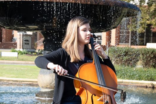 woman playing instrument
