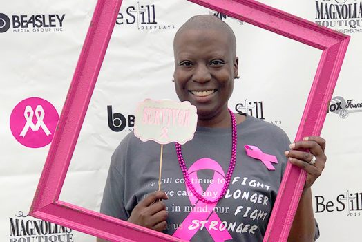 Woman holding picture frame