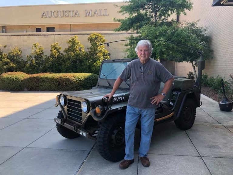 man in front of jeep