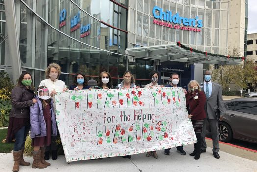 People holding a banner