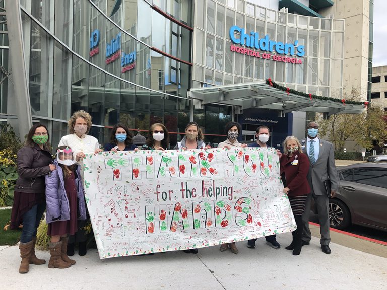 People holding a banner