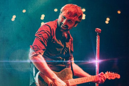 Man playing a guitar