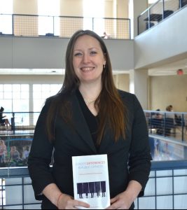 Woman holding book