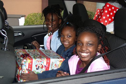 Three girls smiling