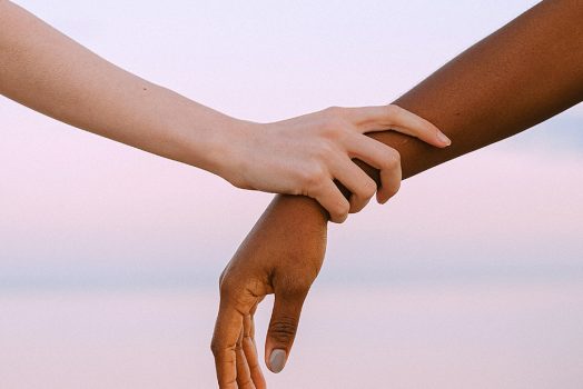 Hand holding arm