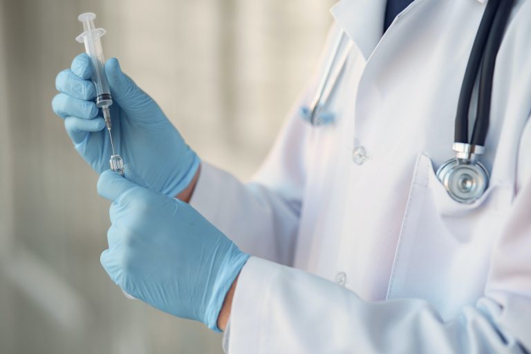 Doctor with shot