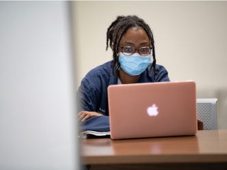 woman using computer