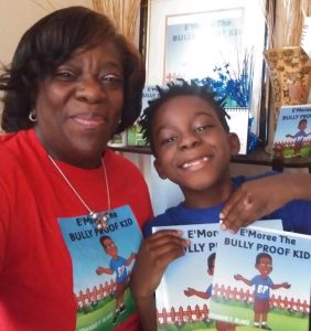 Woman and boy holding books