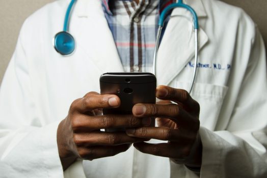 Doctor with cell phone