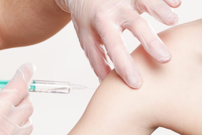 A person getting a shot.