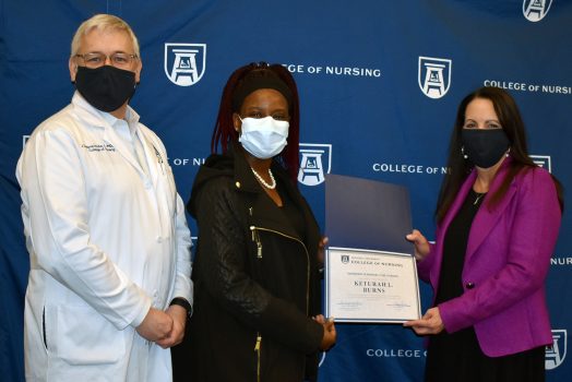 Graduate presented award.