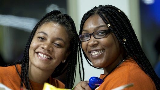 Two women smiling