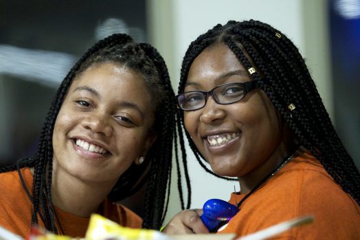 Two women smiling