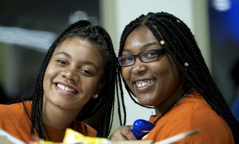 Two women smiling