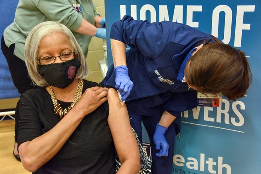 Woman getting vaccine