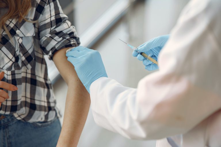 A person getting a shot.