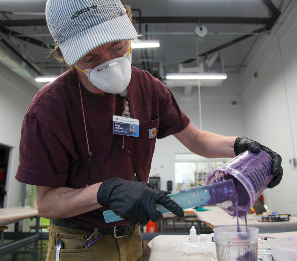 man making a mask