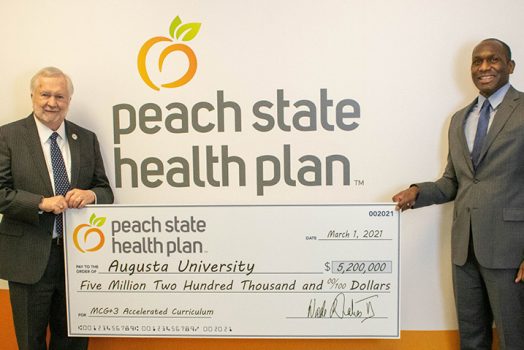 Two men and a check