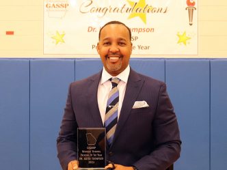Man holding award