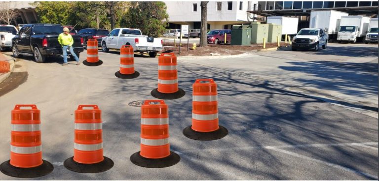orange and white construction barrels