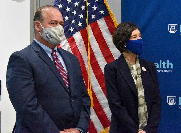 Man and woman in masks