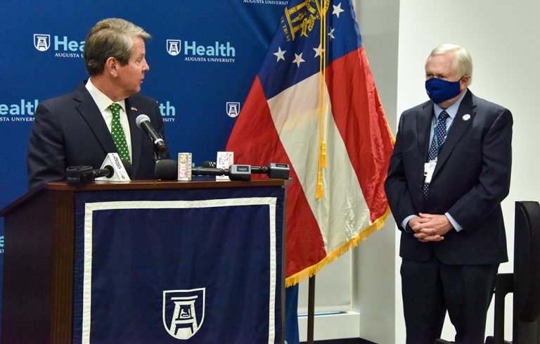 Two men at podium