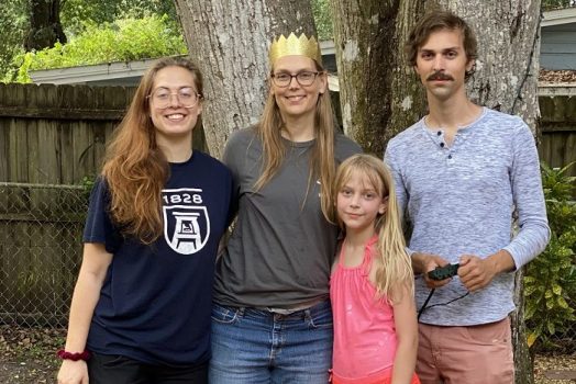 woman with two daughters and adult son