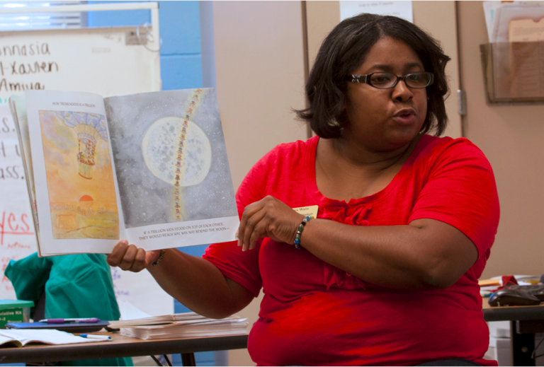 Student presenting poster