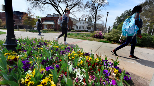 people walking on campus