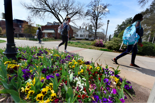 people walking on campus