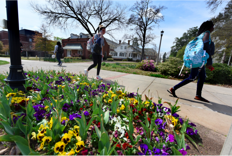 people walking on campus