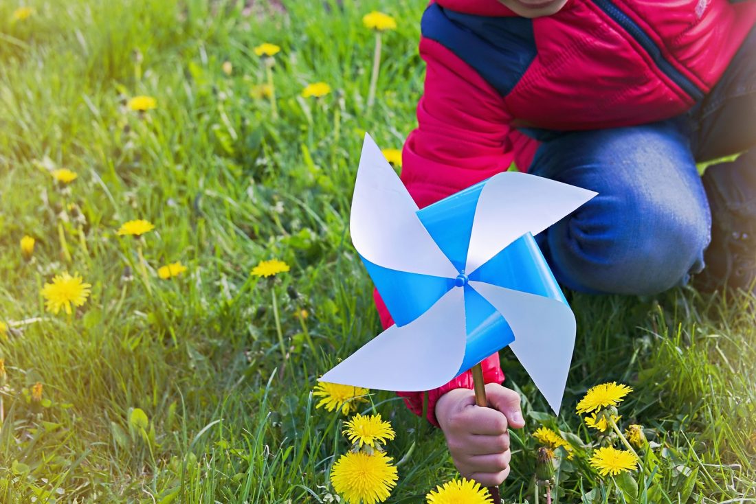 Child with pinwheel