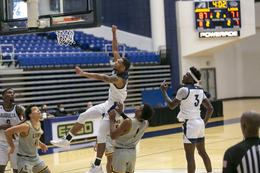 Men playing basketball