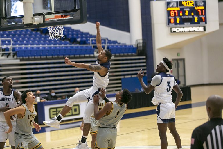 Men playing basketball