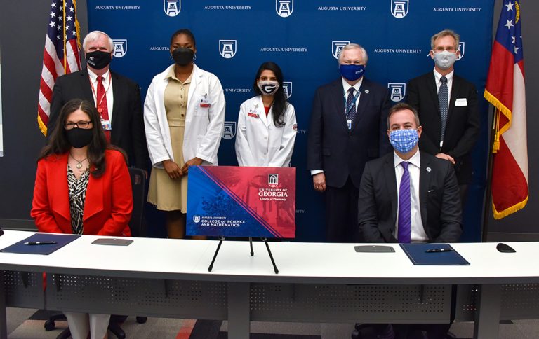 Men and women posing